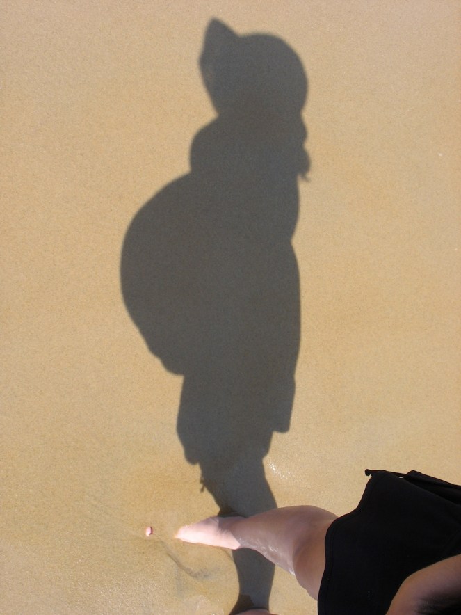 Em pregnant - shadow on beach.jpg