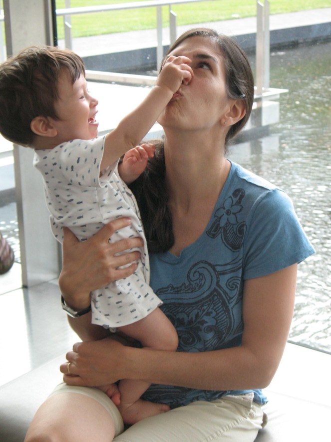 em-with-baby-eliot-playing-with-her-nose